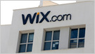 Wix zwalnia 20% pracowników przez AI i kursy walut